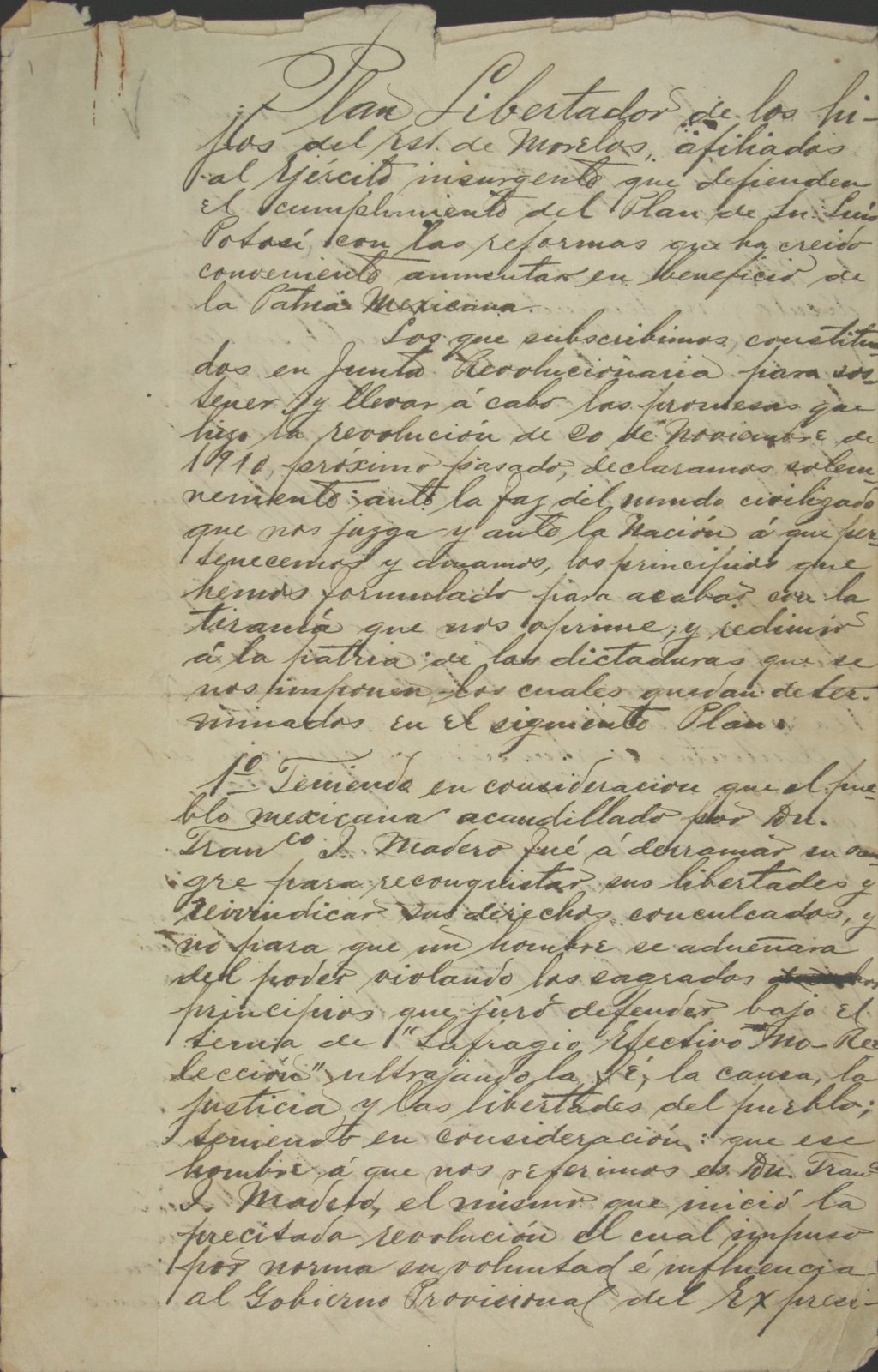 Handwritten manuscript page of the Plan of Ayala in faded ink on aged paper